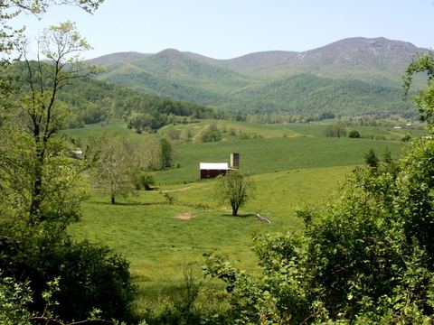 Valley farmland below the mountains