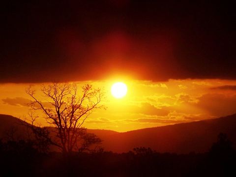 Orange sunset over the hills